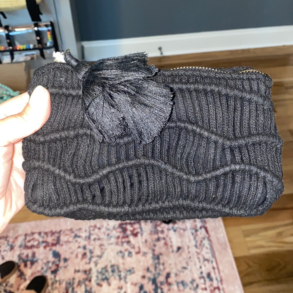 Small pouch with tassel zipper pull